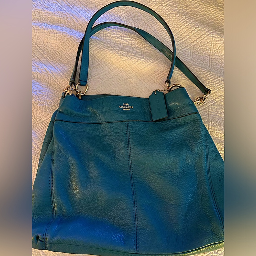 Coach teal colored leather bag